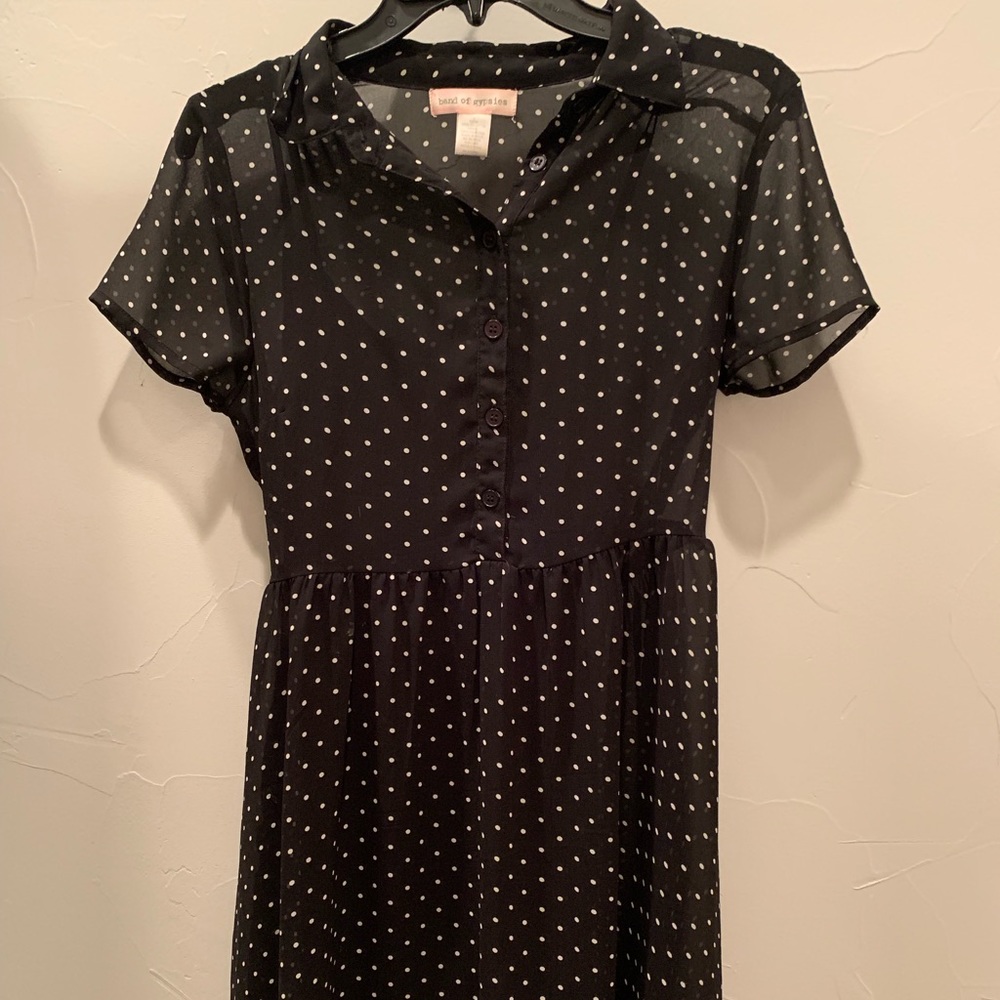Women’s black and white polkadot dress